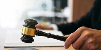 Crimes: Judge Removes DA’s Office Judge's hand holding a gavel over a sound block