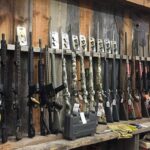 AR-15 Ban Gamble Hits High Court rack of rifles and shotguns in a gun store