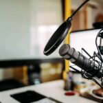 Lawsuit Looms: Short Clip, Big Controversy Podcast microphone with pop filter on desk