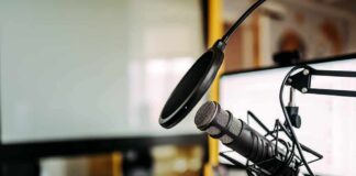 Lawsuit Looms: Short Clip, Big Controversy Podcast microphone with pop filter on desk