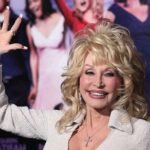 Dolly Parton waving at an event