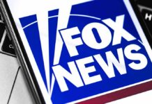 Convention Stunt Sparks Meme Backlash Fox News logo displayed on a smartphone screen