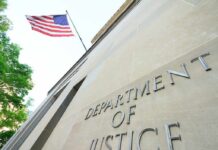 Department of Justice building with American flag