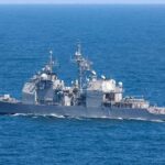 Iran Claims U.S. Submersible Capture Gray naval warship cruising on open sea