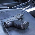 Handgun on a car seat