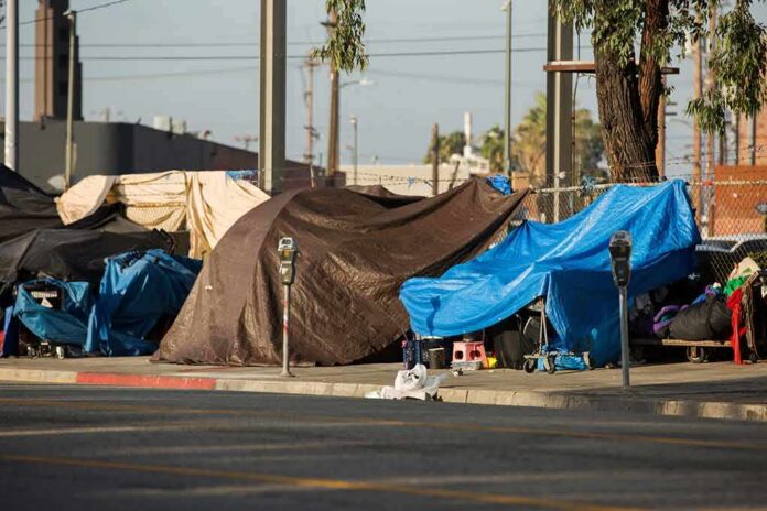 Street tents covered with tarps along a sidewalk