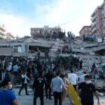 Russian Glide Bombs Hit Zaporizhzhia Homes Rescue workers and civilians on collapsed building after earthquake