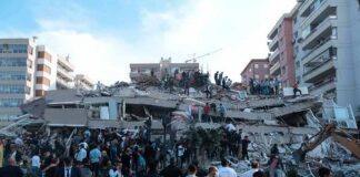 Russian Glide Bombs Hit Zaporizhzhia Homes Rescue workers and civilians on collapsed building after earthquake