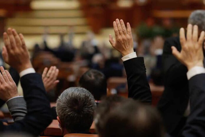 Raised hands in a formal meeting or vote