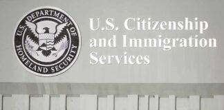 USCIS building sign with DHS seal