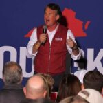 Trump’s PICK Triumphs in ELECTION Shocker man speaking on stage at a rally