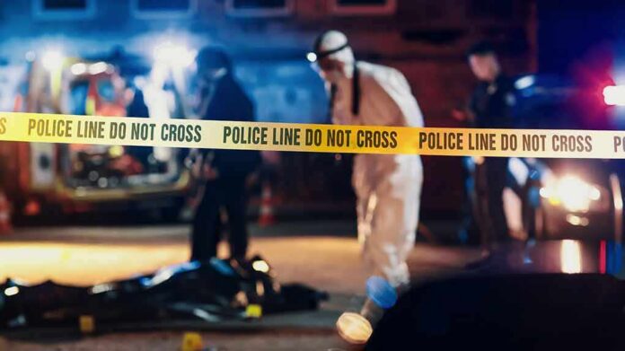 Police tape at nighttime crime scene
