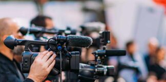 Ukraine Deploys Thousands of Ground Robots Video cameras on tripods at a media event