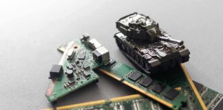 Toy tank on computer memory sticks and circuit boards