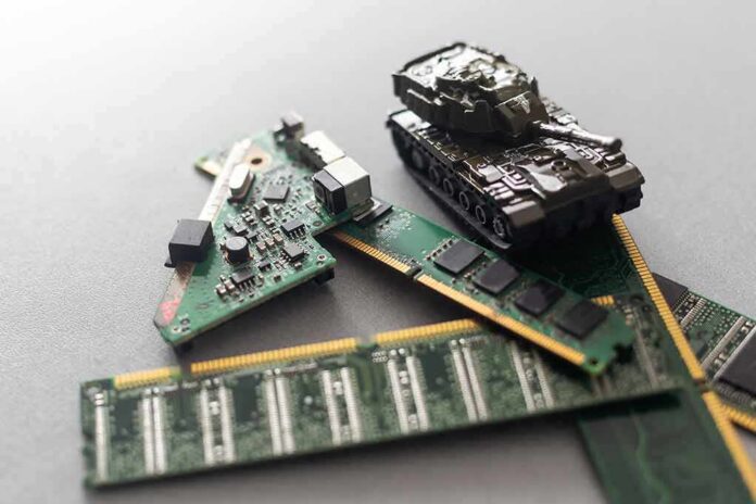 Toy tank on computer memory sticks and circuit boards