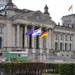 STUNNING Flip: Merkel’s Legacy ABANDONED Overnight Reichstag building with flags in front