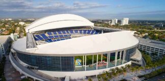Baseball stadium with retractable roof partially open