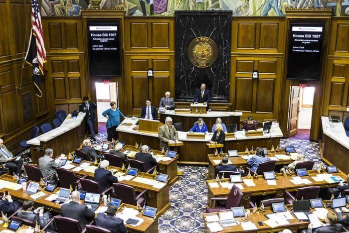 shutterstock_620657567-1 Legislative chamber with lawmakers debating a bill