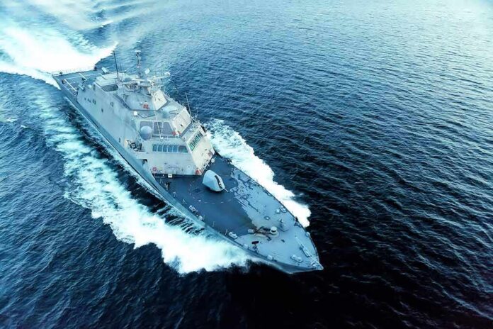 shutterstock_724184326 Naval warship cutting through open sea