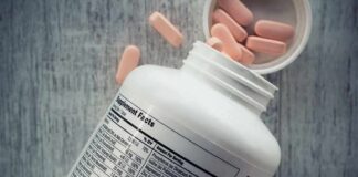 Tomato Paste May Boost Brain Performance Vitamin supplement bottle with pink tablets and nutrition label