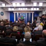 Trump’s Backroom Twist Freezes GOP Press secretary at podium addressing reporters in briefing room