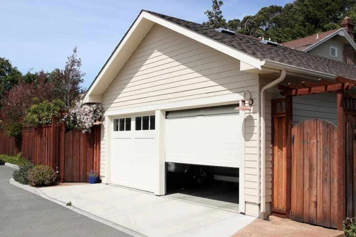 shutterstock_78983230 Detached garage with partially open door