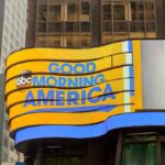 FCC Targets The View in New Legal Fight Curved digital billboard with Good Morning America logo