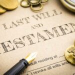 Last will and testament document with fountain pen, coins, key, and pocket watch