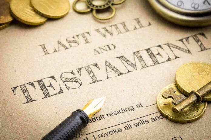 shutterstock_1076385488 Last will and testament document with fountain pen, coins, key, and pocket watch