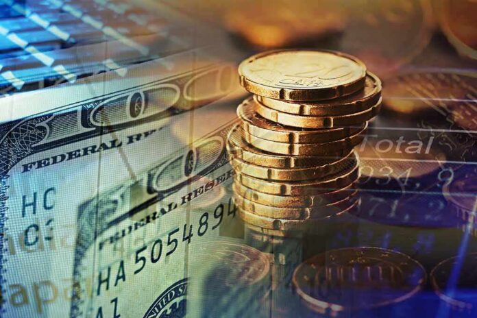 Stack of coins with US dollar bills and financial data overlay
