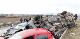 Multi-Truck Wreck Ends Veteran’s Return Overturned truck and damaged cars after highway crash