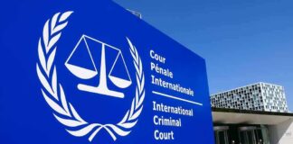U.S. Sanctions International Criminal Court Judges International Criminal Court sign with scales emblem outside modern building