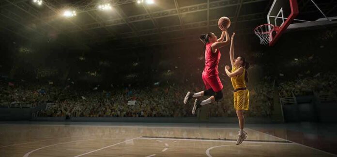 Two women playing basketball; Michelle Jenneke is not visible