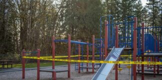 Offender Release Sparks Safety Concerns Playground equipment wrapped with caution tape