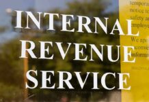 NYC Doubles Taxpayer-Funded Artist Grants to $10,000 Internal Revenue Service sign on glass door