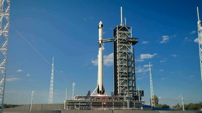 shutterstock_1819616306 Rocket on launch pad under clear blue sky