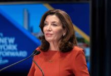 One Remark Reignites New York’s Governor Race Kathy Hochul speaking at a podium with microphones