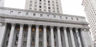 Federal Agents Search Omar’s Home United States courthouse with grand neoclassical columns
