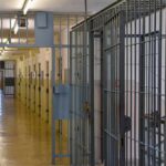 Execution Halted After Second Failed Attempt Prison corridor with barred doors