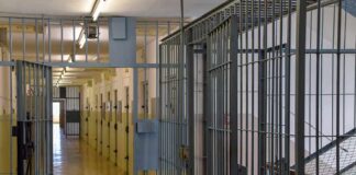 Execution Halted After Second Failed Attempt Prison corridor with barred doors