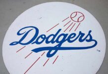 Brewers Take 2-0 NLCS Lead Over Dodgers Dodgers logo with baseball and motion lines