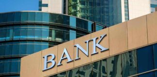 Brink’s Blunder: $128K Found on ATM Returned to Bank bank building exterior with glass and signage