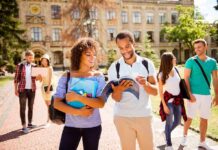 Columbus Day vs. Indigenous Peoples’ Day College students walking on campus with books and backpacks